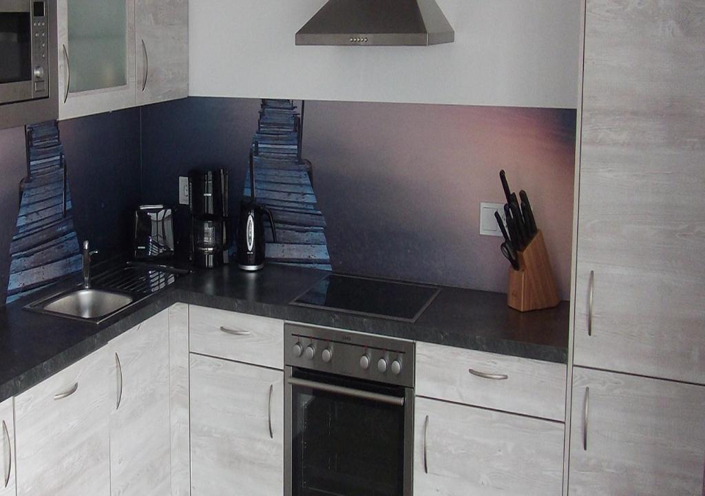 Ferienwohnung Admiral Suite room 4